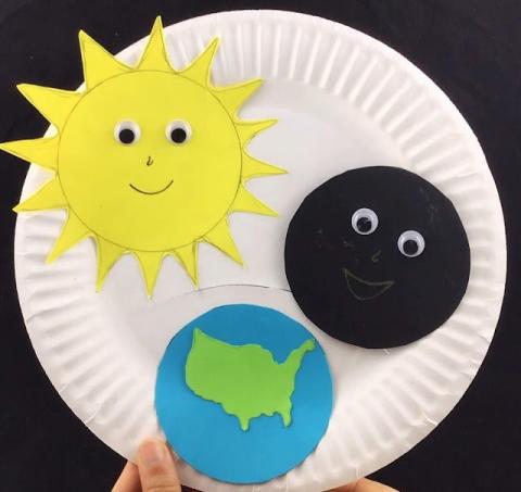 Image of solar eclipse recreated on a paper plate