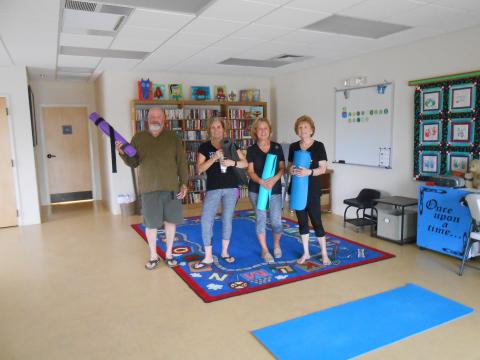 Image of people doing yoga