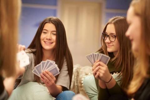 Teens playing card games