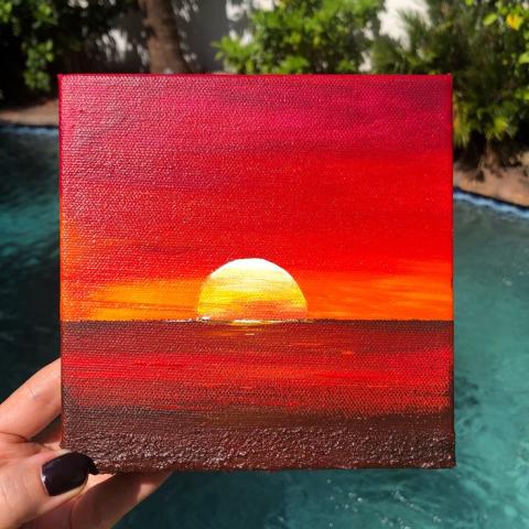 Image of sunset painted on canvas