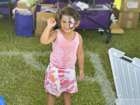 Image of kid with face painted