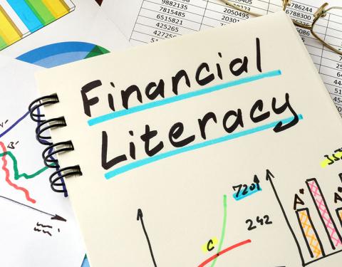 Image of financial literacy written on a notebook