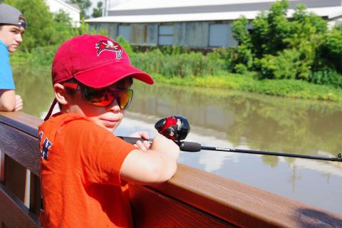 Image of kid fishing