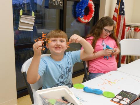 Image of kid using 3Doodler Pens