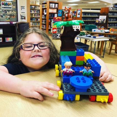 Image of child playing with Lego