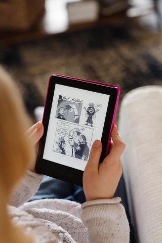 Image of child reading eBook