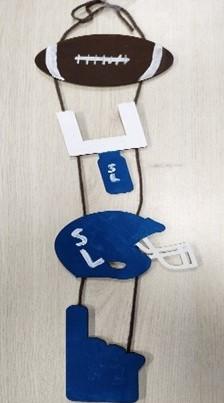 Image of football door hanger