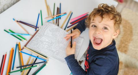 Image of kid coloring 
