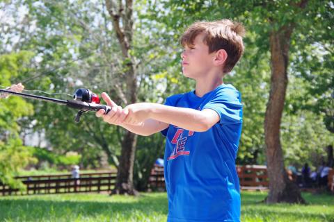 Image of kid fishing