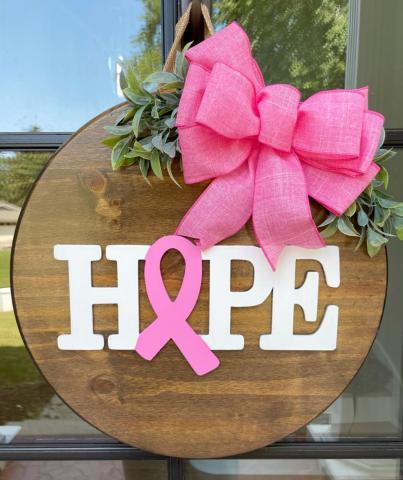 Image of breast cancer door hanger