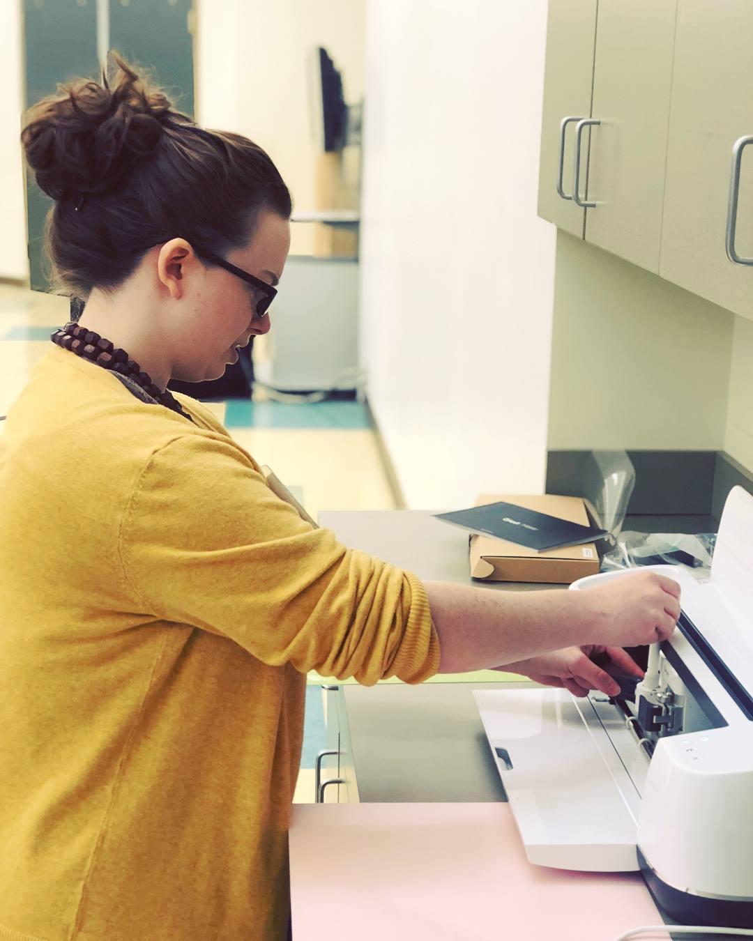 Image of woman working with Cricut