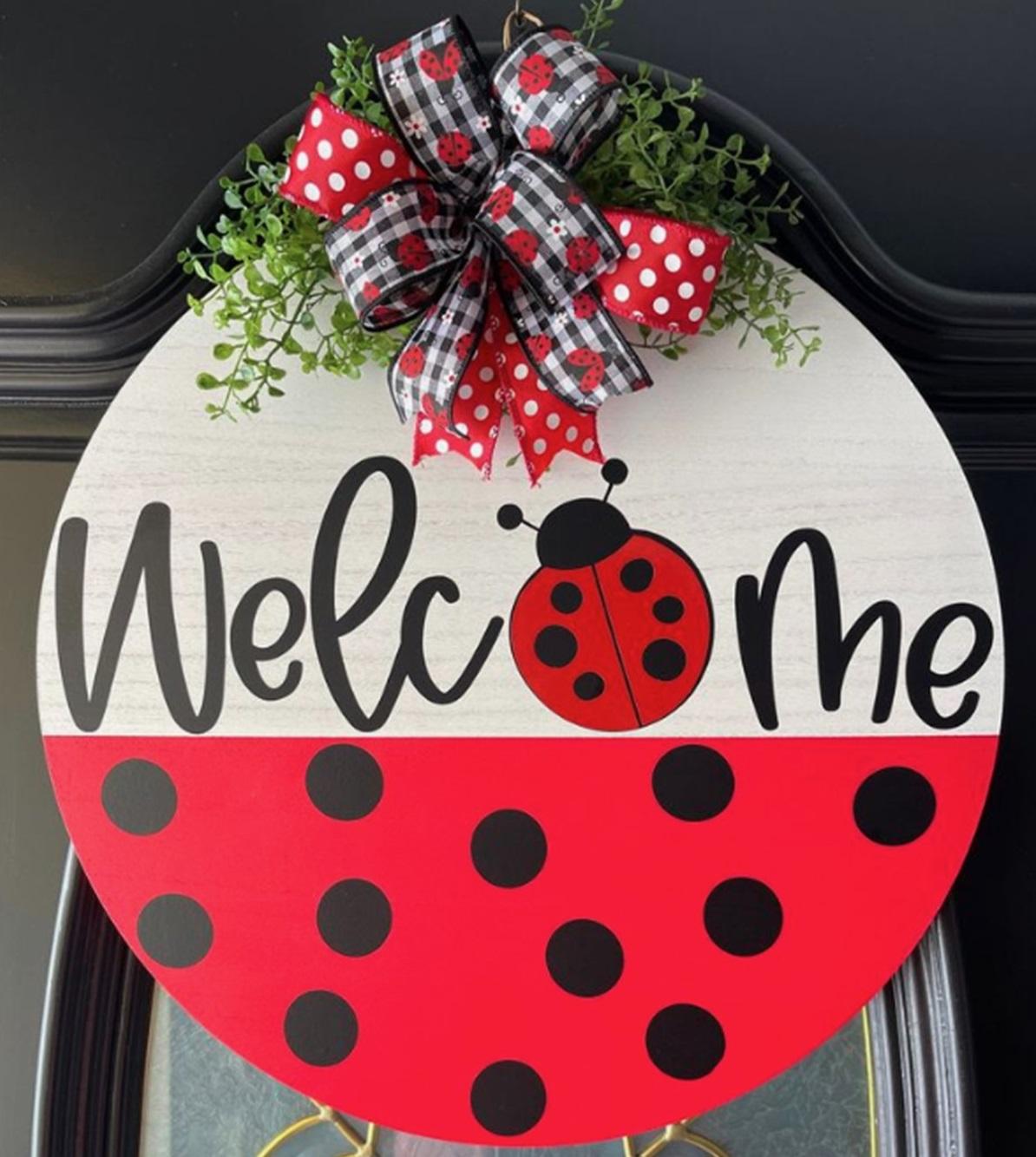 Image of ladybug-themed door hanger