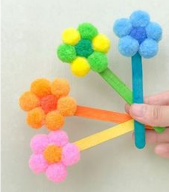 Images of bookmarks made with pom poms