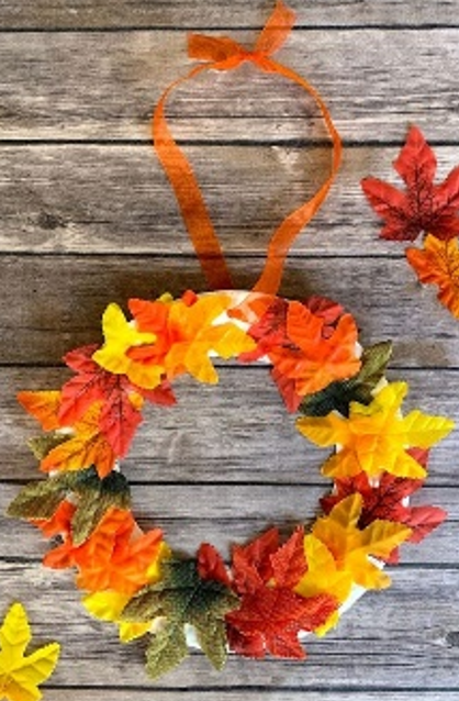 Image of wreath made from fall leaves