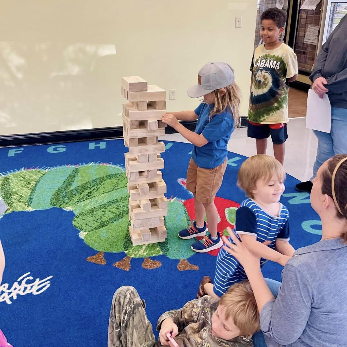 Image of kids playing Giant Jenga